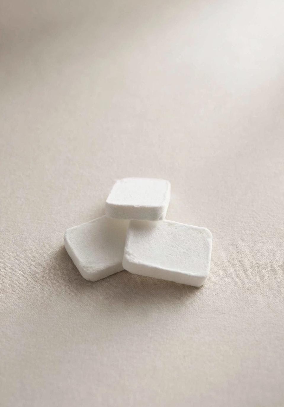 Pastillas cuadradas de toallita comprimida IMPULSS antes de mojarlas
